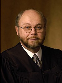 Dissenting Cirrus Judge Roger Klaphake